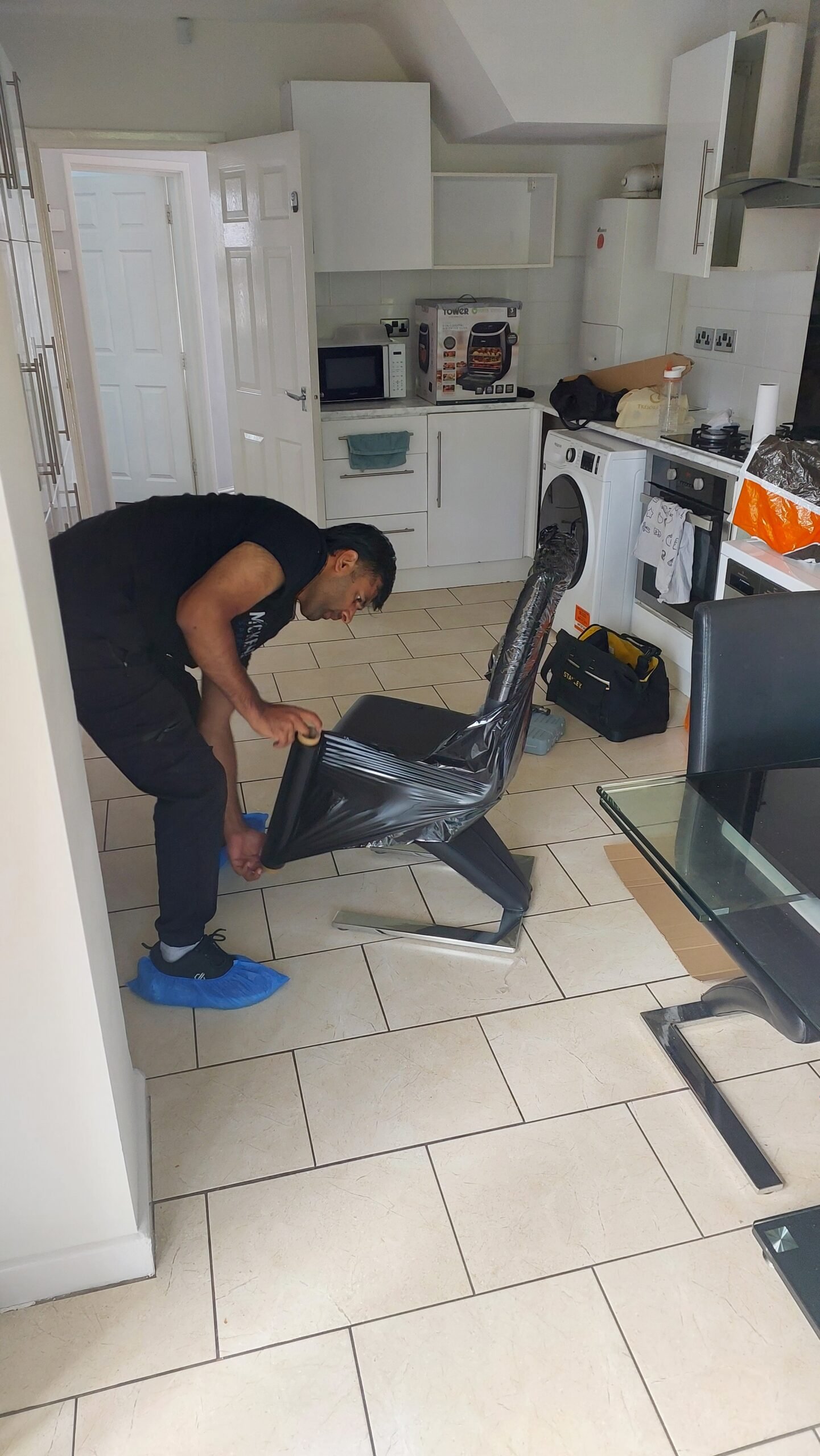 Professional packing service wrapping chair